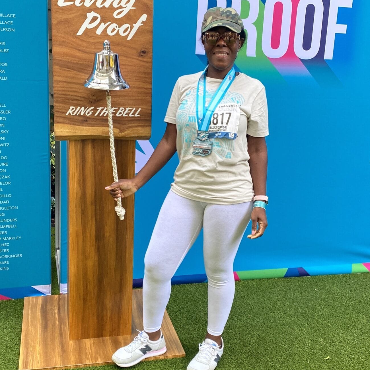 Jessica is taking a photo at the dolphins' cancer 6K